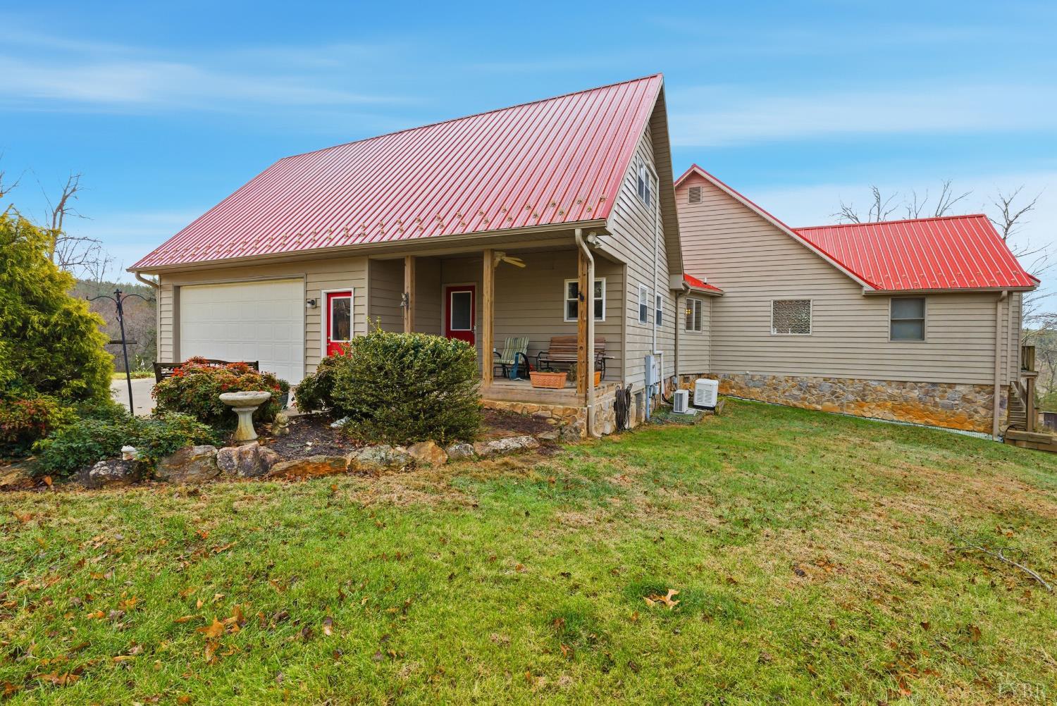 2481 School Crossing Road Lynch Station, VA 24571 - Photo 6 of 47 a view of a house with backyard and sitting area