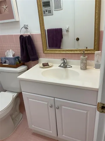 a view of a balcony and chairs