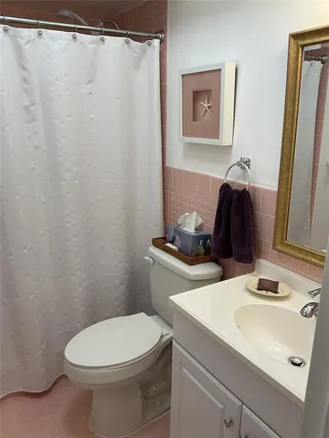 a view of swimming pool with seating area