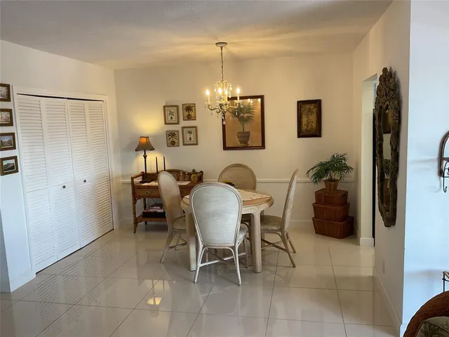 a room with furniture and a chandelier
