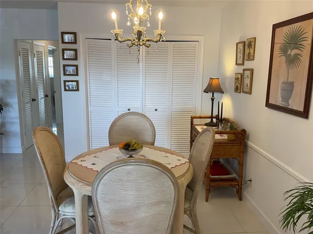 a kitchen with stainless steel appliances granite countertop a sink and a stove