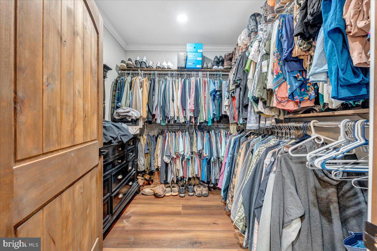 415 Grahams Farm Road Stuart, VA 24171 - Photo 38 of 121 Spacious closet with organized attire.