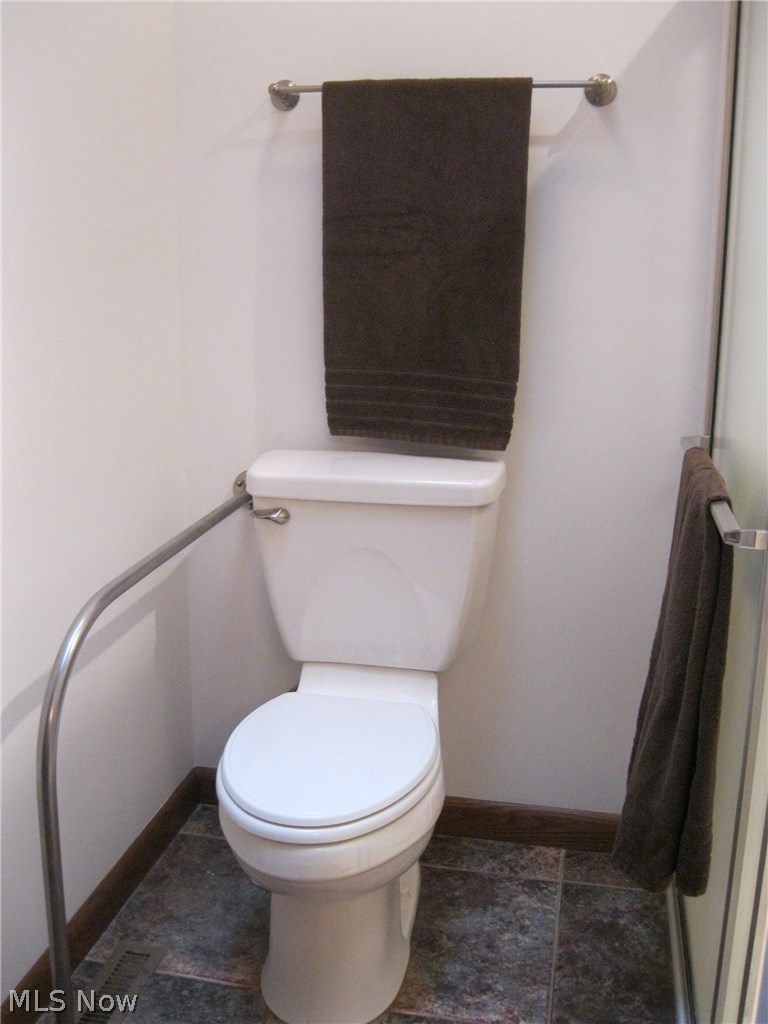 500 Miley Road North Lima, OH 44452 - Photo 20 of 35 Railing, just in case... plus shower has seat. Handicap helpful! Doorway to bathroom is wider, also!