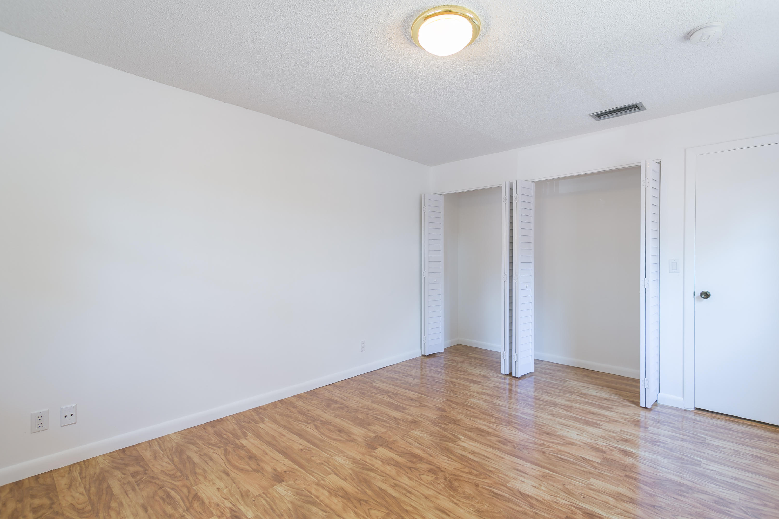 6850 Northwest 2nd Avenue, Unit 290 Boca Raton, FL 33487 - Photo 12 of 17 Guest Bedroom - Closet Angle