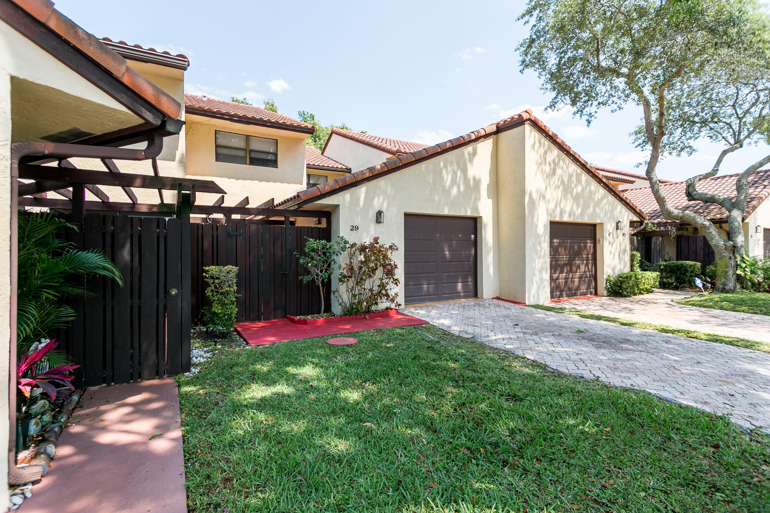 6850 Northwest 2nd Avenue, Unit 290 Boca Raton, FL 33487 - Photo 2 of 17 Front of Townhouse
