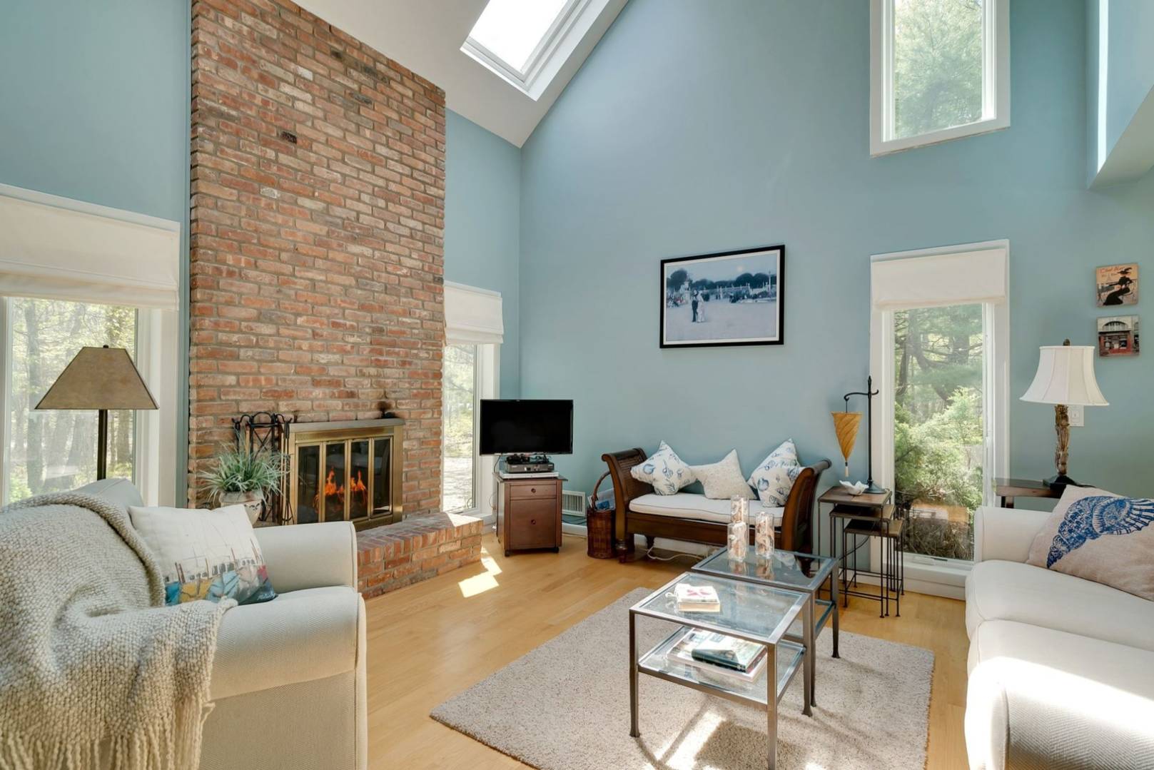 3 Crows Nest Circle Southampton, NY 11968 - Photo 4 of 18 a living room with furniture or couch and a fireplace