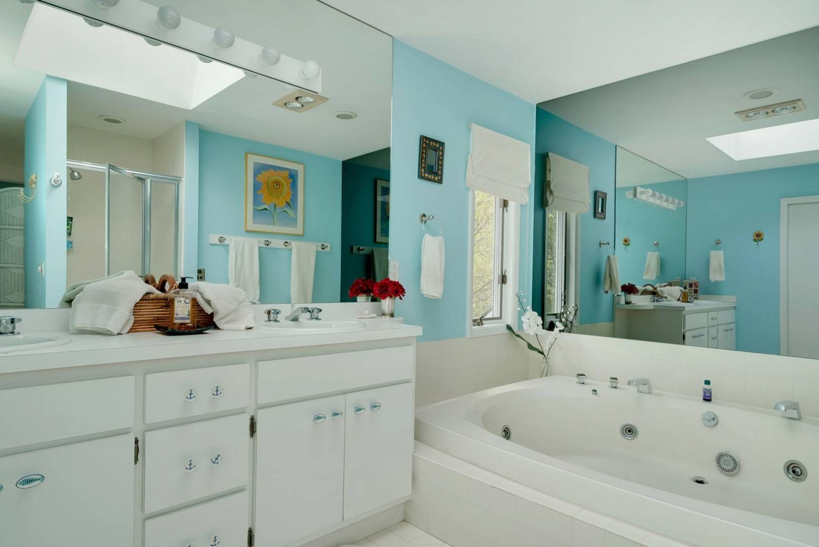 3 Crows Nest Circle Southampton, NY 11968 - Photo 9 of 18 a bathroom with a tub sink and mirror