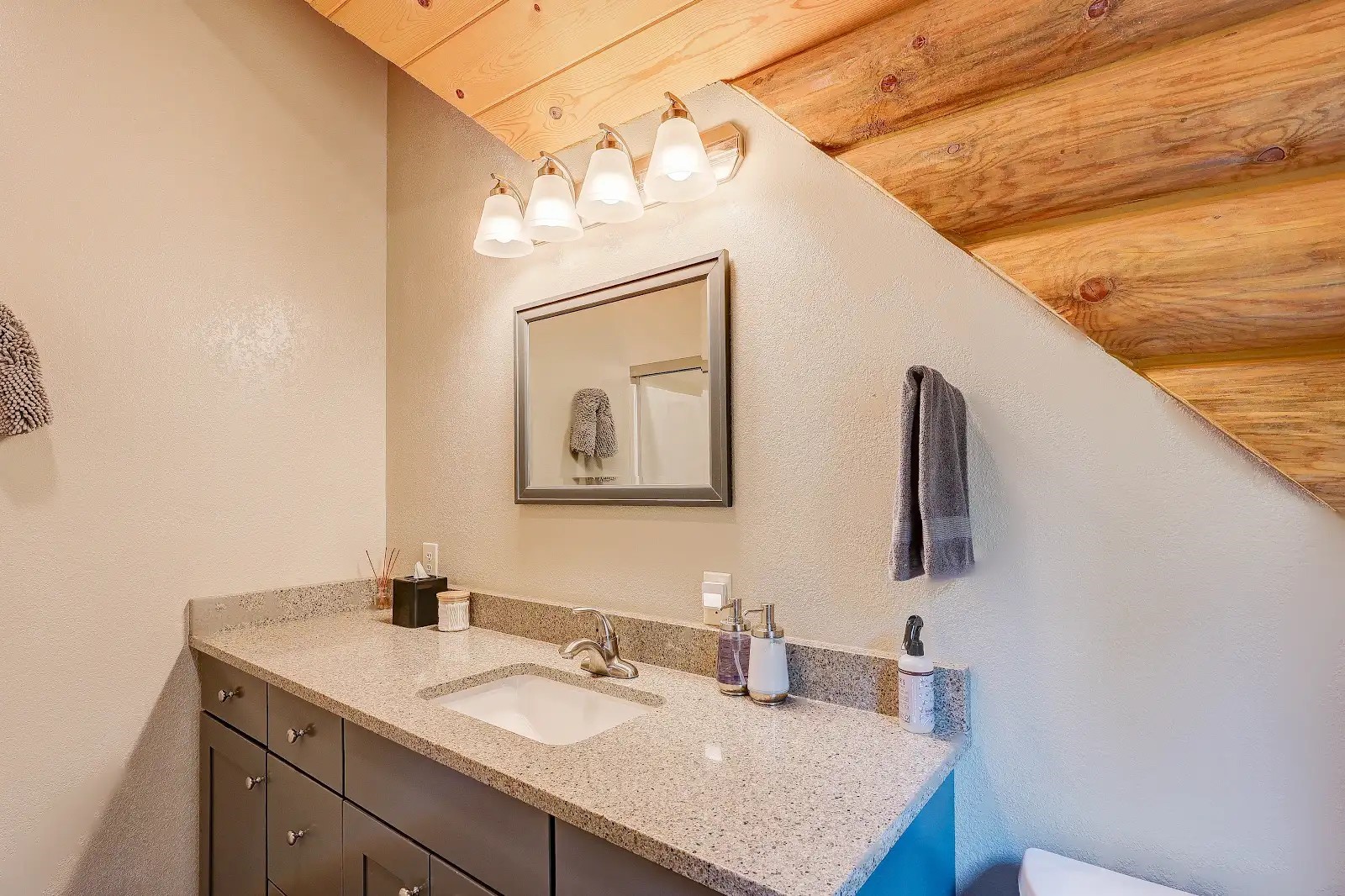 395 Miners Way Fairplay, CO 80440 - Photo 18 of 43 a bathroom with a sink vanity and a mirror