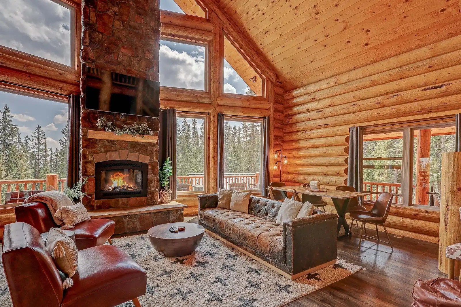 395 Miners Way Fairplay, CO 80440 - Photo 2 of 43 a living room with furniture fireplace and a large window