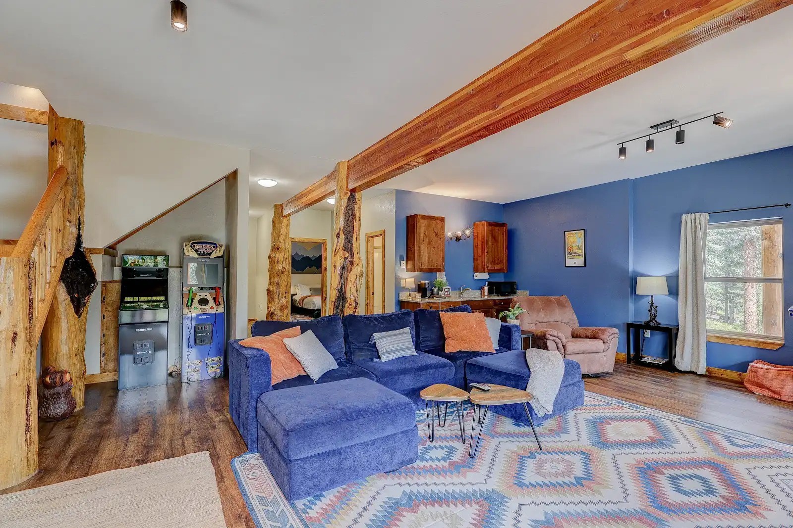 395 Miners Way Fairplay, CO 80440 - Photo 25 of 43 a living room with furniture a wooden floor and next to a window