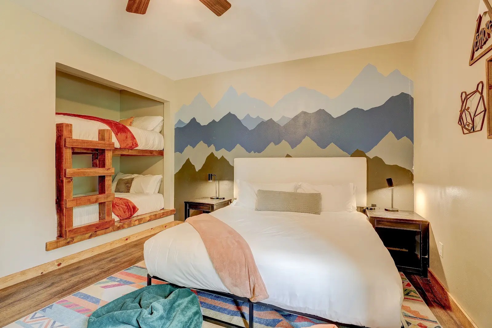 395 Miners Way Fairplay, CO 80440 - Photo 29 of 43 a bedroom with a bed and a lamp on dresser