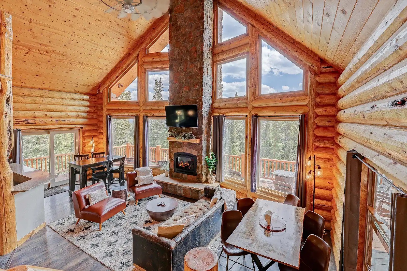 395 Miners Way Fairplay, CO 80440 - Photo 3 of 43 a outdoor space with patio the couches and a dining table with chairs