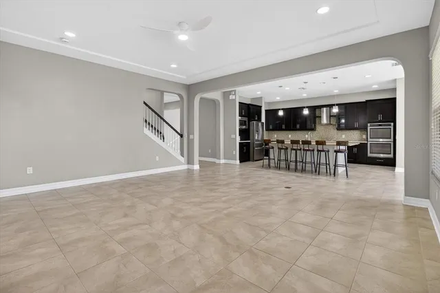 a en suite bathroom with a double vanity sink a mirror and a shower
