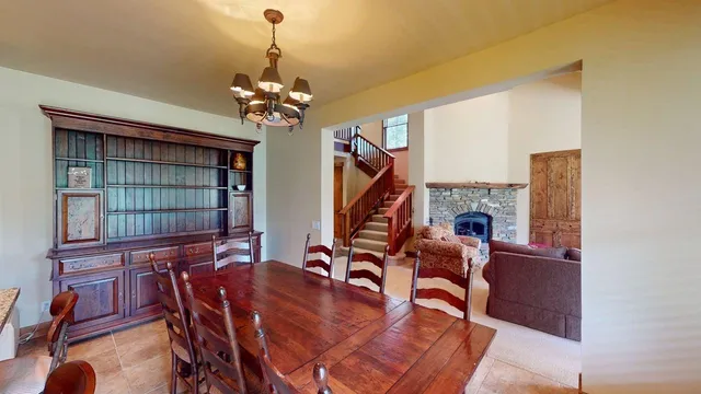 a view of a livingroom with furniture and a chandelier