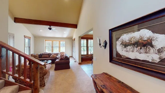 a living room with furniture and window
