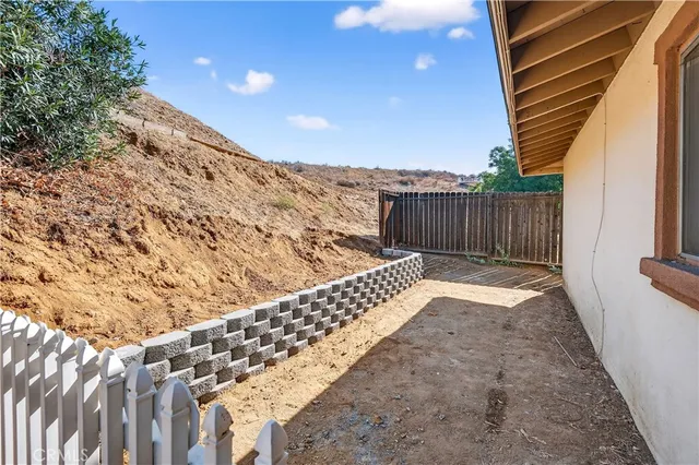a view of stairs and wooden fence