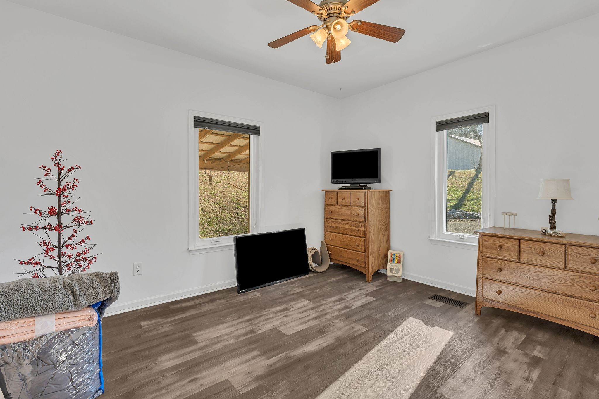 5063 Miller Lake Road Culleoka, TN 38451 - Photo 13 of 22 a view of room with window and hardwood floor
