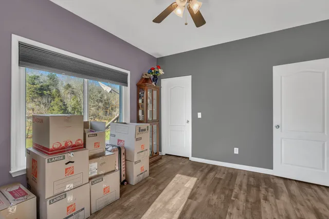 a view of workspace with furniture and window