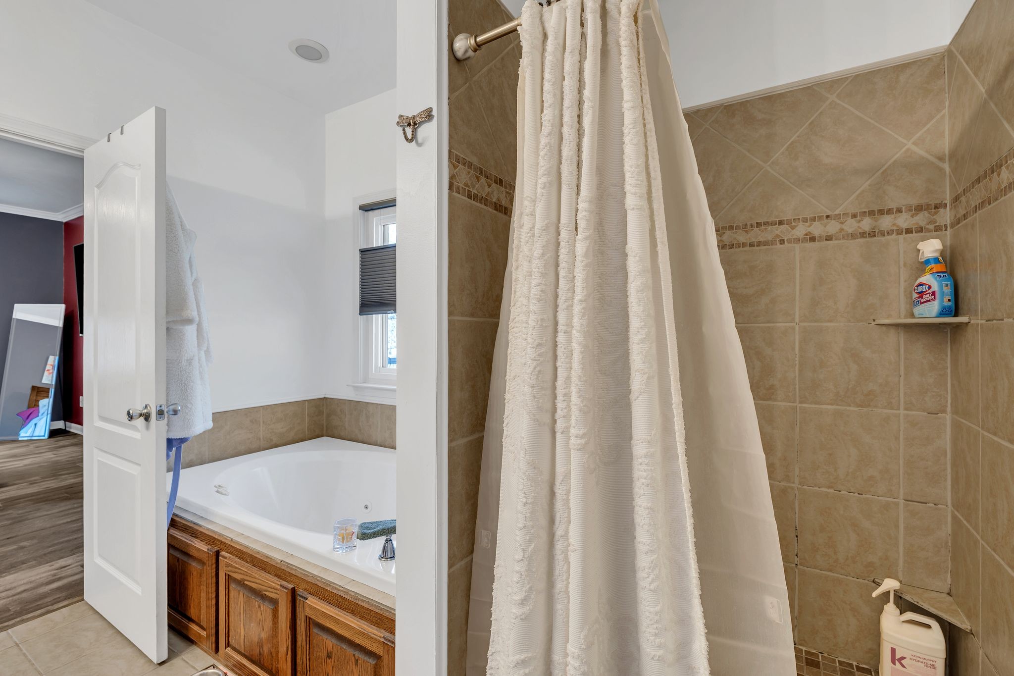 5063 Miller Lake Road Culleoka, TN 38451 - Photo 9 of 22 a bathroom with a tub and shower