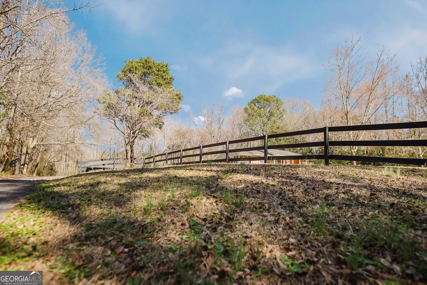 348 School Road Hampton, GA 30228 - Photo 32 of 46 a view of a wooden fence