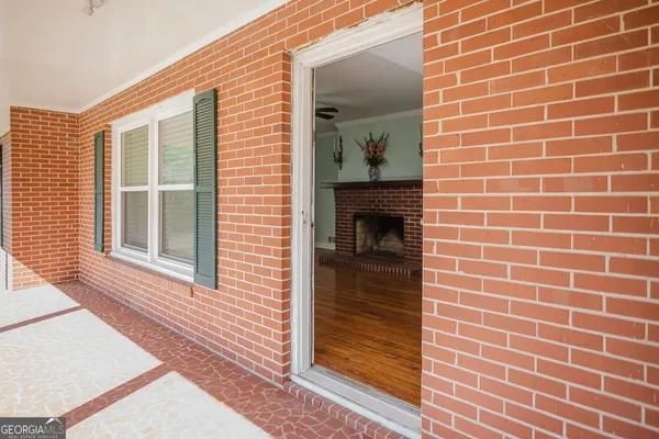 a view of an empty room and window
