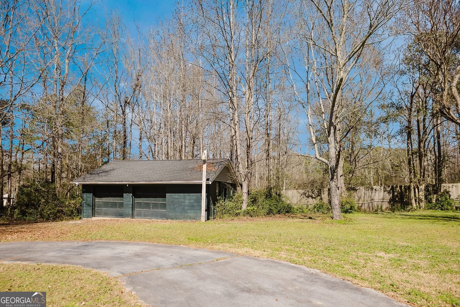 348 School Road Hampton, GA 30228 - Photo 40 of 46 a front view of house with yard and trees