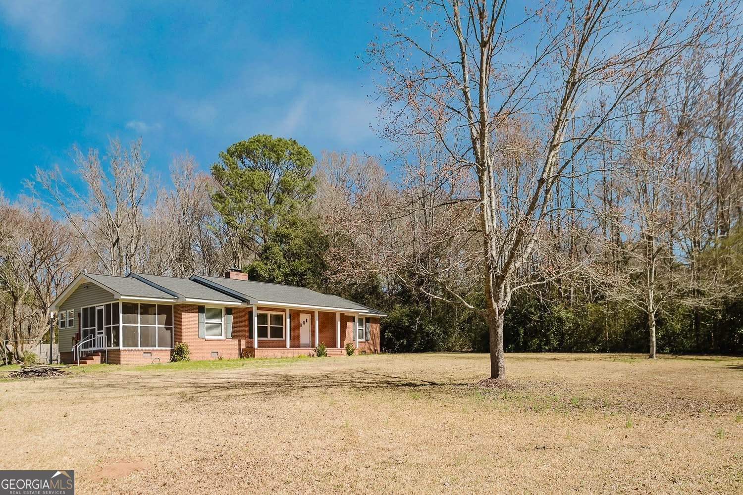 348 School Road Hampton, GA 30228 - Photo 45 of 46 a front view of a house with a yard