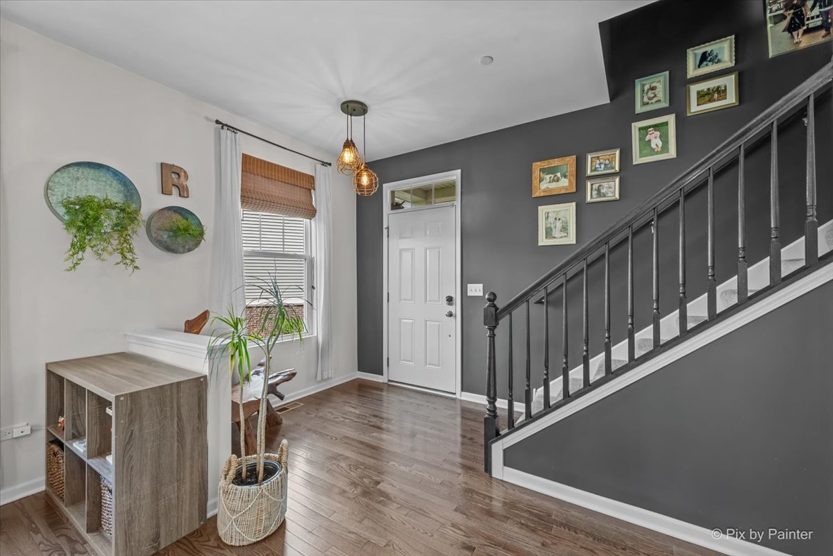 16207 West Switch Grass Road Lockport, IL 60441 - Photo 6 of 45 a view of an entryway and wooden floor