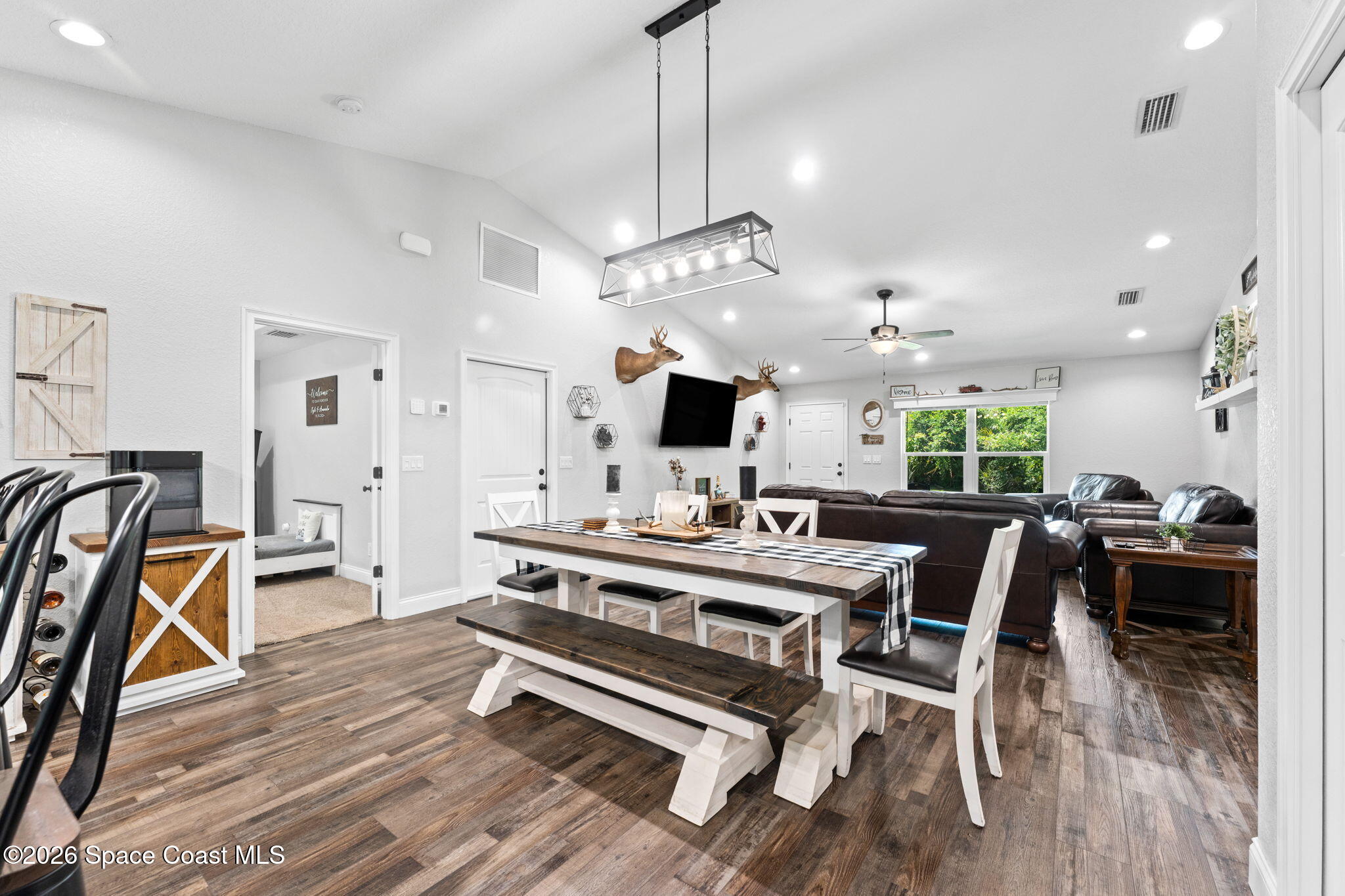 3760 Montgomery Road Mims, FL 32754 - Photo 9 of 46 living/dining/kitchen