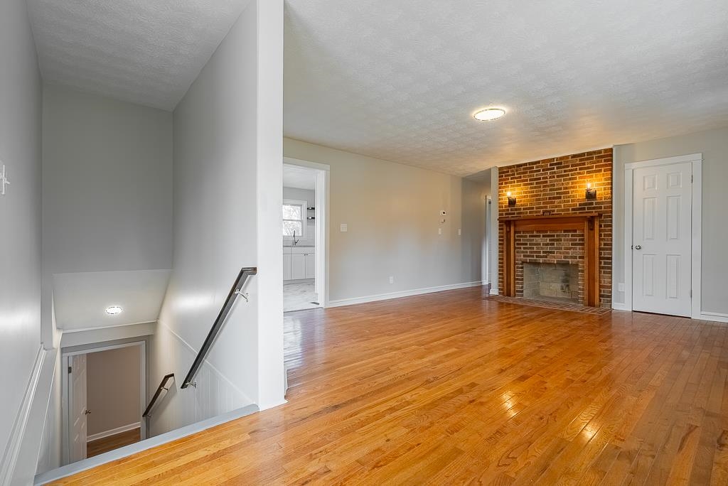 212 Esther's Lookout Shenandoah, VA 22849 - Photo 11 of 68 a view of an empty room with wooden floor and a window
