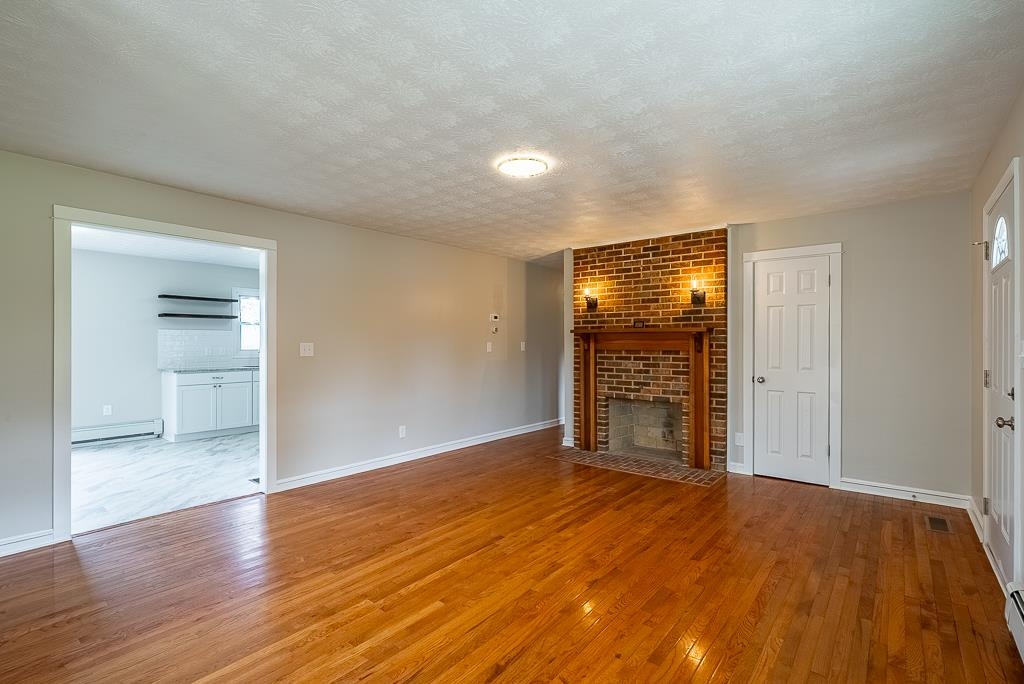 212 Esther's Lookout Shenandoah, VA 22849 - Photo 12 of 68 a view of an empty room with wooden floor and a window