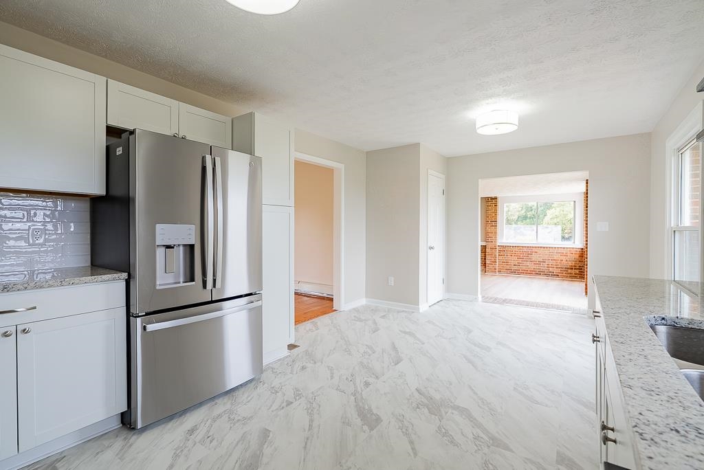 212 Esther's Lookout Shenandoah, VA 22849 - Photo 18 of 68 a kitchen with stainless steel appliances granite countertop a refrigerator and a stove