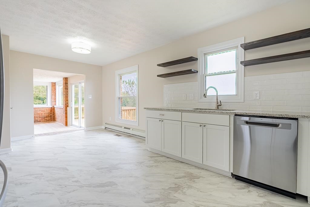 212 Esther's Lookout Shenandoah, VA 22849 - Photo 19 of 68 a view of a kitchen with sink cabinets and window