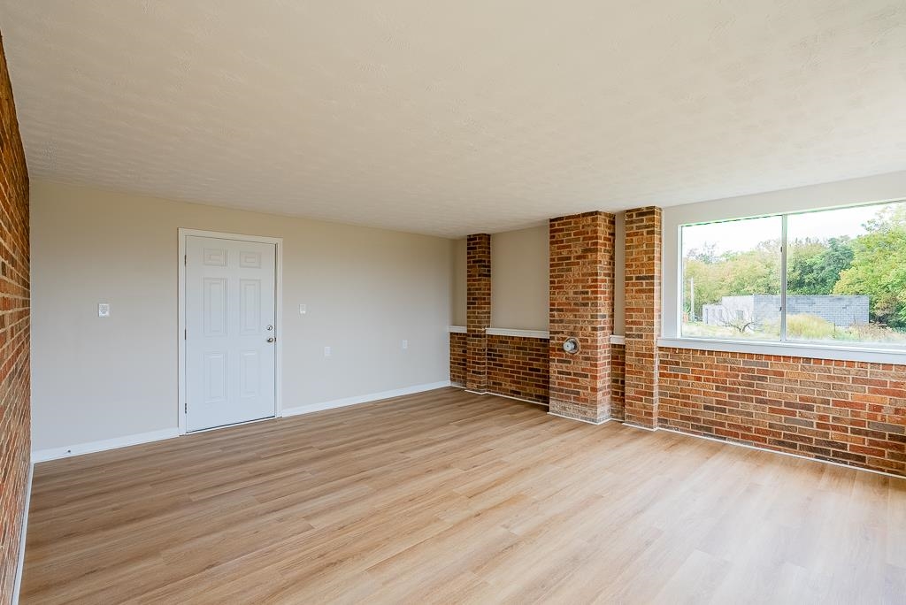 212 Esther's Lookout Shenandoah, VA 22849 - Photo 22 of 68 an empty room with wooden floor and windows