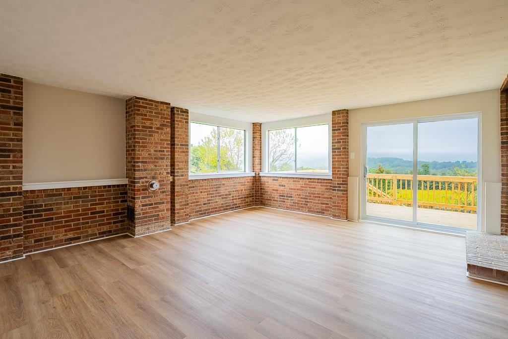 212 Esther's Lookout Shenandoah, VA 22849 - Photo 23 of 68 wooden floor in an empty room with a window