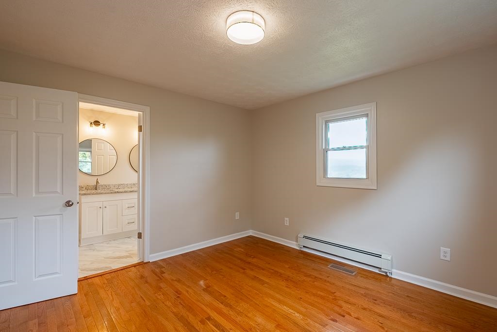 212 Esther's Lookout Shenandoah, VA 22849 - Photo 36 of 68 a bedroom with a bed and a window