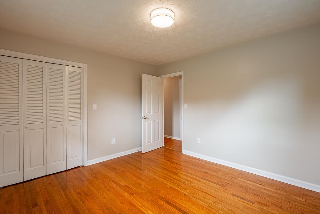 212 Esther's Lookout Shenandoah, VA 22849 - Photo 41 of 68 a view of an empty room with wooden floor