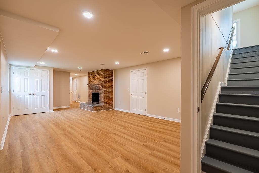 212 Esther's Lookout Shenandoah, VA 22849 - Photo 42 of 68 a view of an empty room with wooden floor and stairs