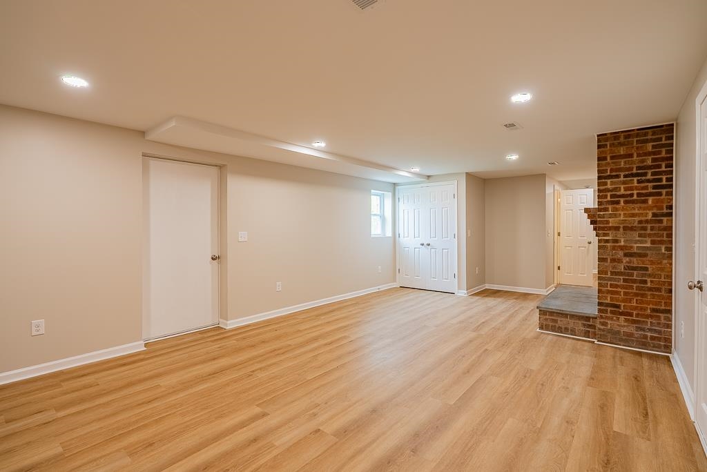 212 Esther's Lookout Shenandoah, VA 22849 - Photo 44 of 68 a view of an empty room with wooden floor and closet