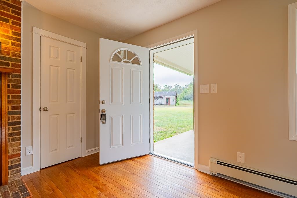 212 Esther's Lookout Shenandoah, VA 22849 - Photo 6 of 68 an empty room with wooden floor and windows