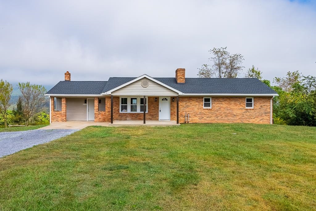212 Esther's Lookout Shenandoah, VA 22849 - Photo 68 of 68 a front view of a house with a garden