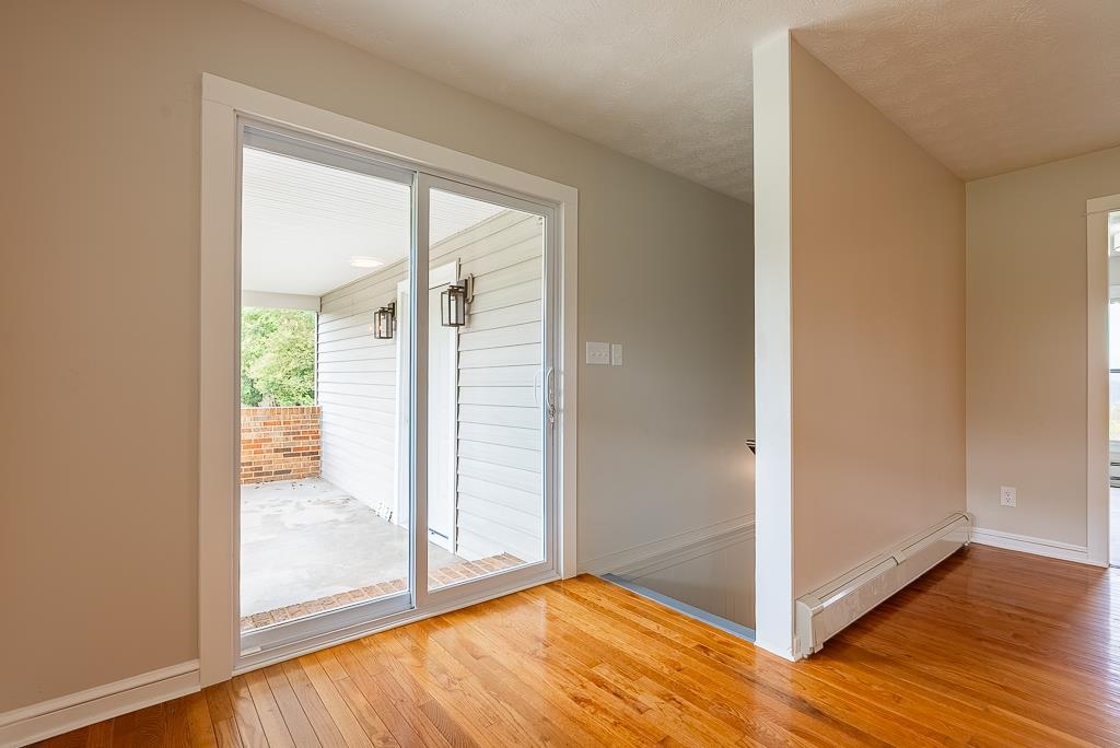 212 Esther's Lookout Shenandoah, VA 22849 - Photo 10 of 68 an empty room with wooden floor and windows