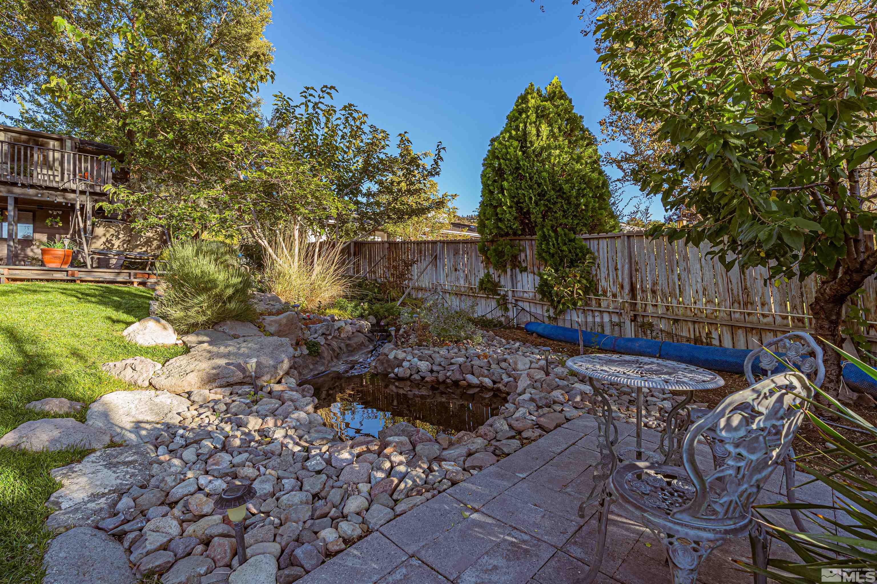 14285 Virginia Foothills Drive Reno, NV 89521 - Photo 12 of 39 a view of outdoor space patio and swimming pool