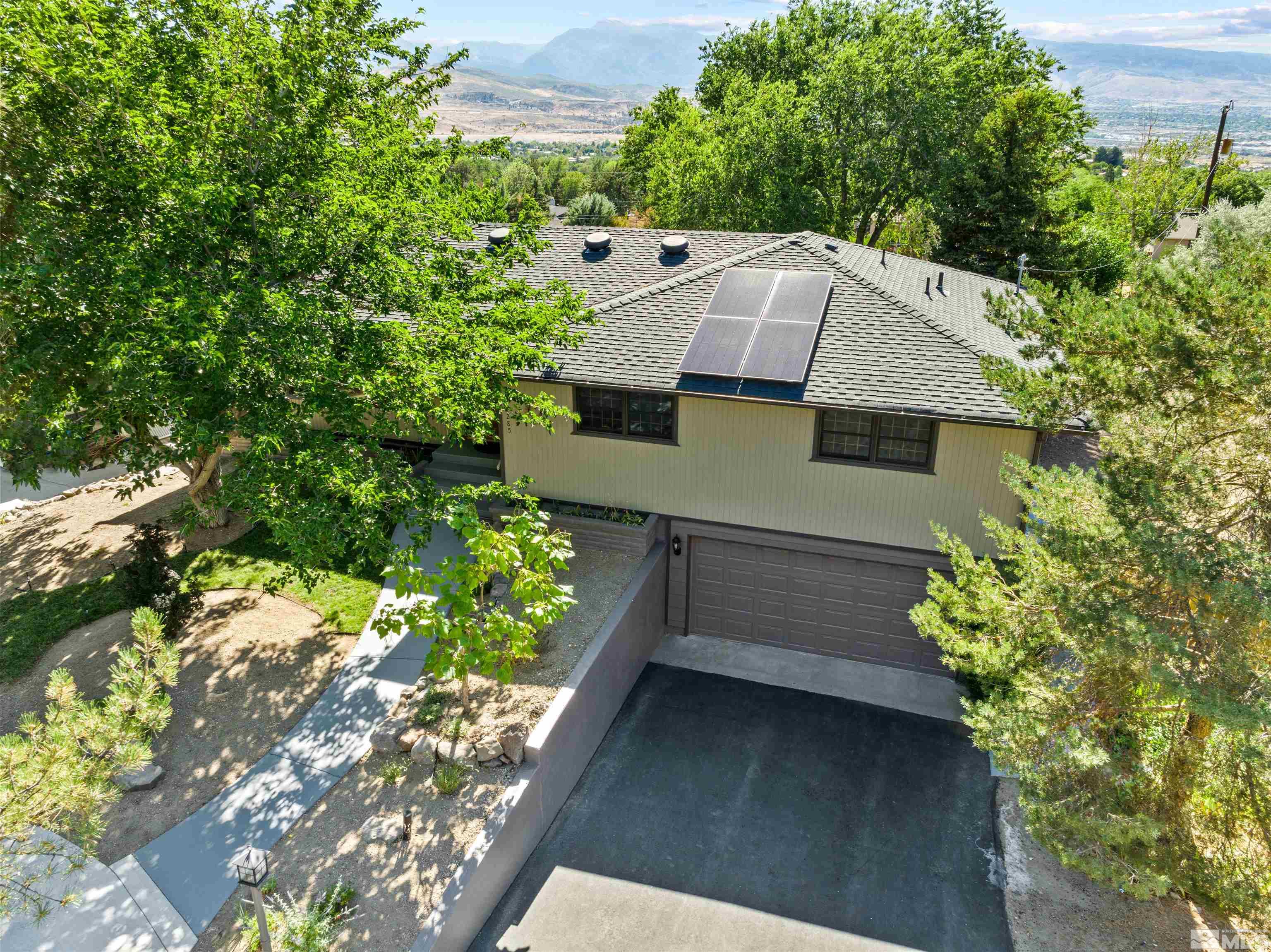 14285 Virginia Foothills Drive Reno, NV 89521 - Photo 26 of 39 a view of a house with a yard