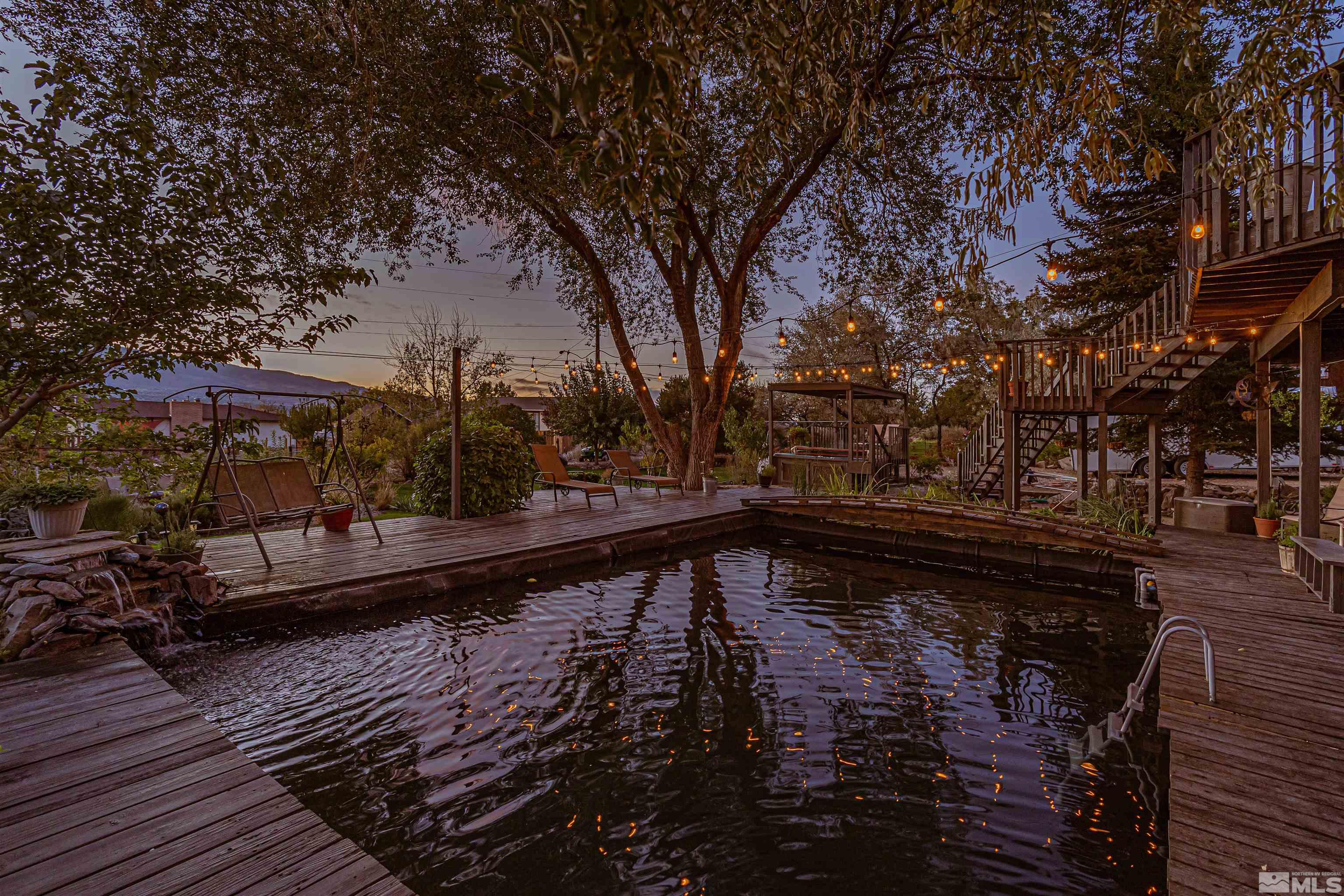 14285 Virginia Foothills Drive Reno, NV 89521 - Photo 29 of 39 a view of a swimming pool with a patio