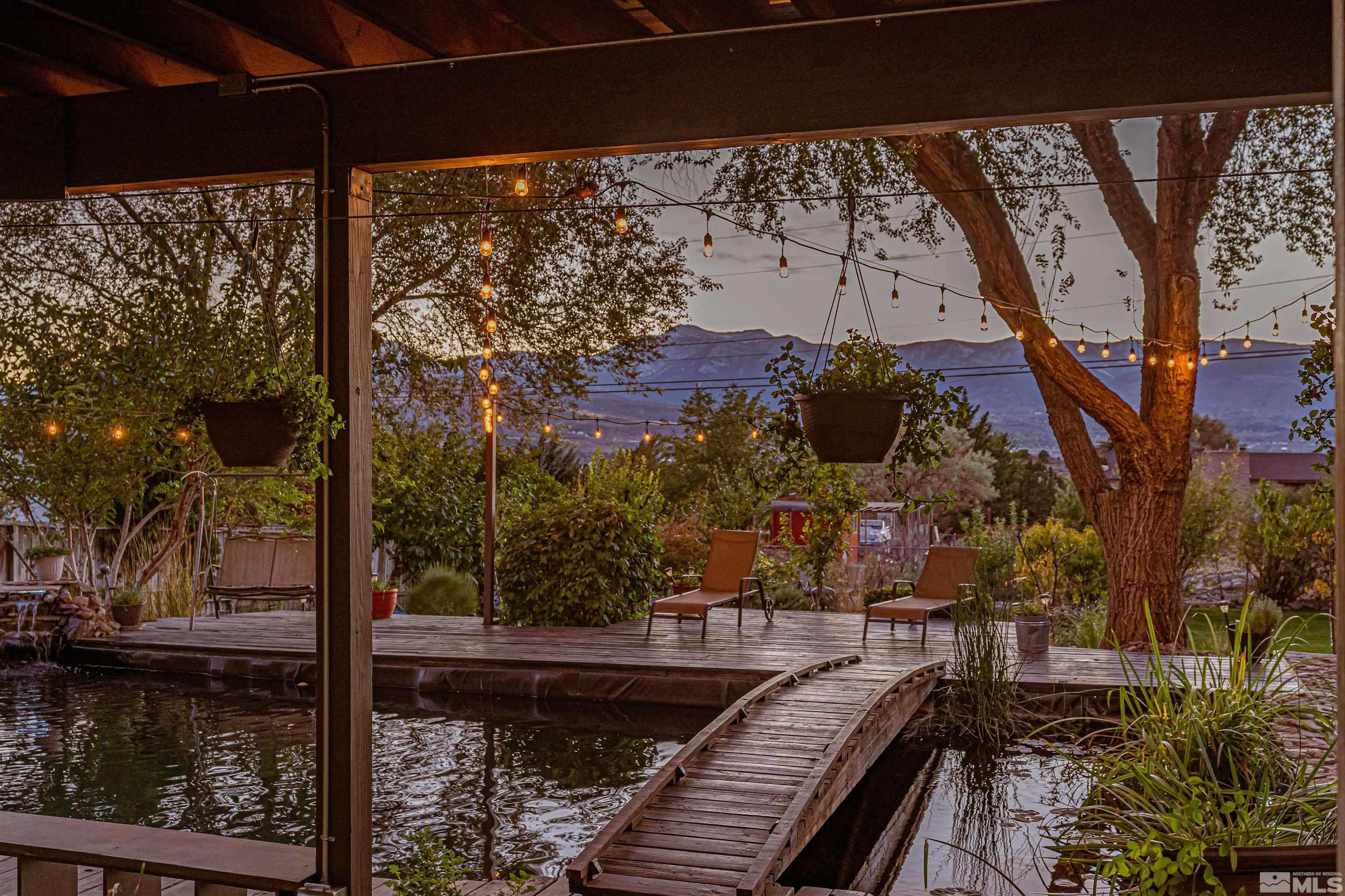 14285 Virginia Foothills Drive Reno, NV 89521 - Photo 7 of 39 a view of a balcony with wooden floor