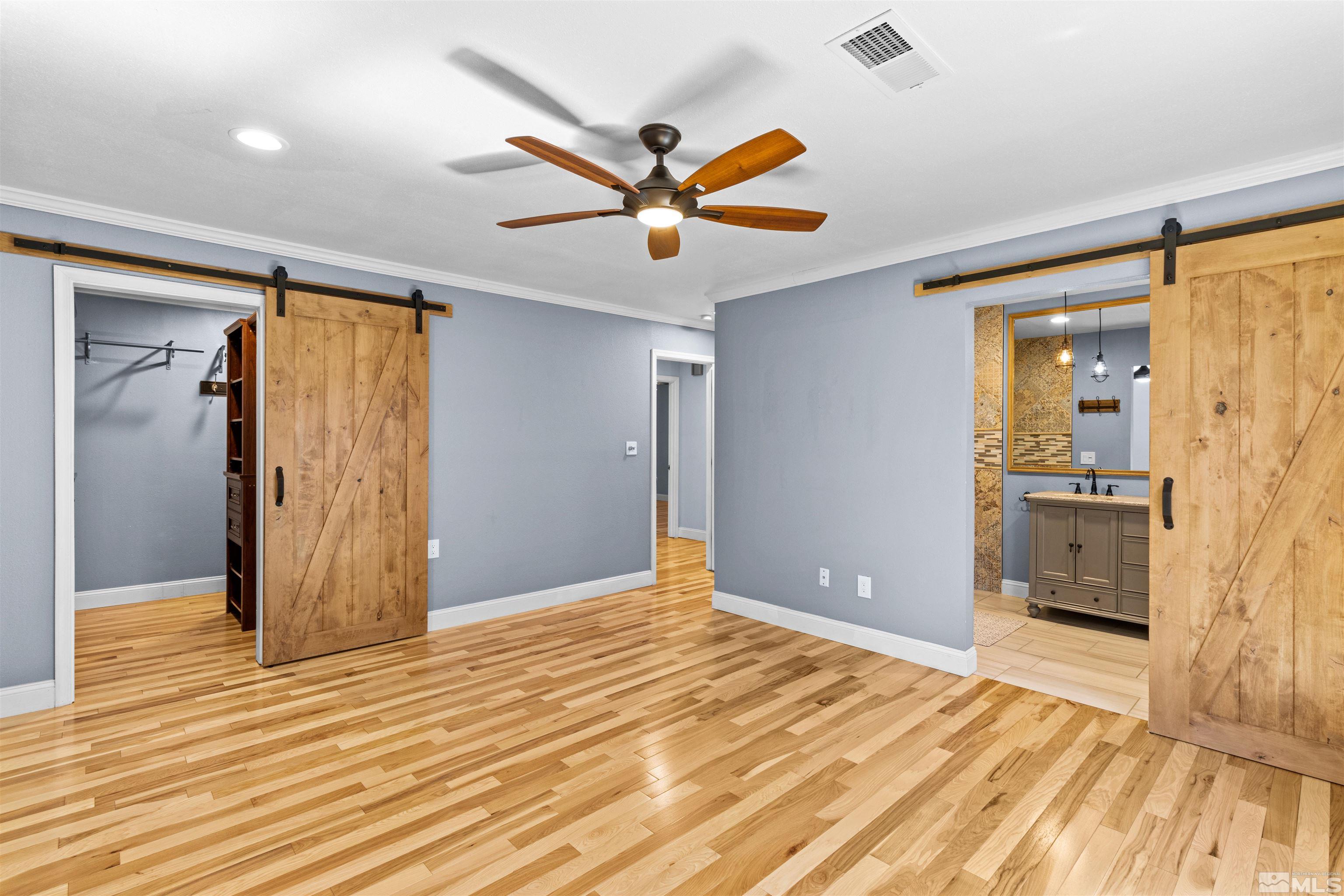 14285 Virginia Foothills Drive Reno, NV 89521 - Photo 8 of 39 a view of empty room with wooden floor
