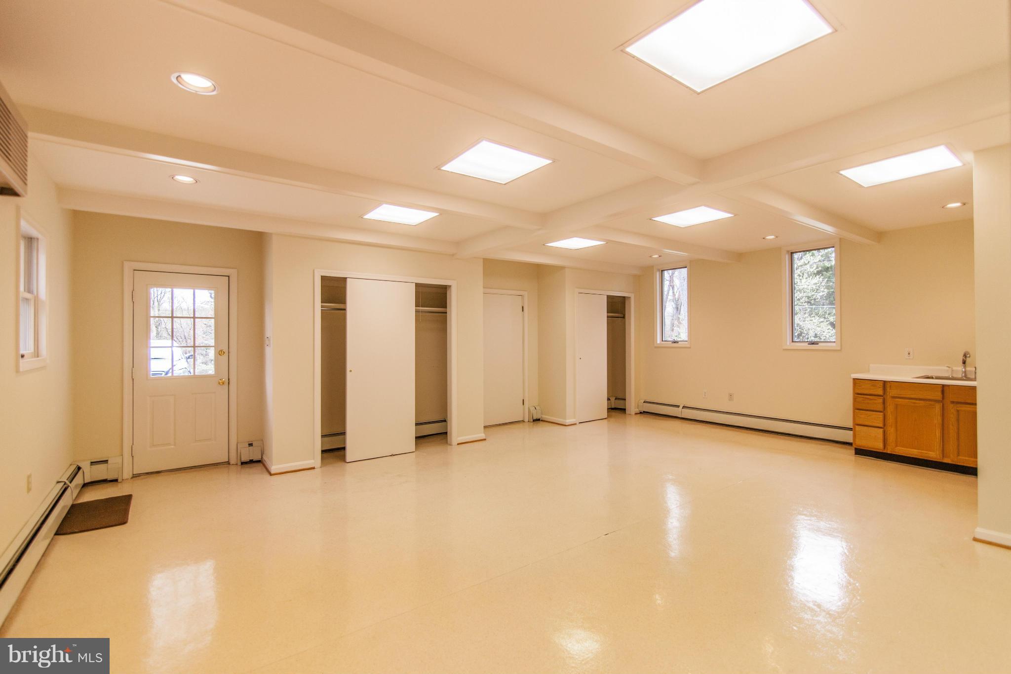 13407 Roxbury Road Silver Spring, MD 20904 - Photo 15 of 23 a view of an empty room with a window