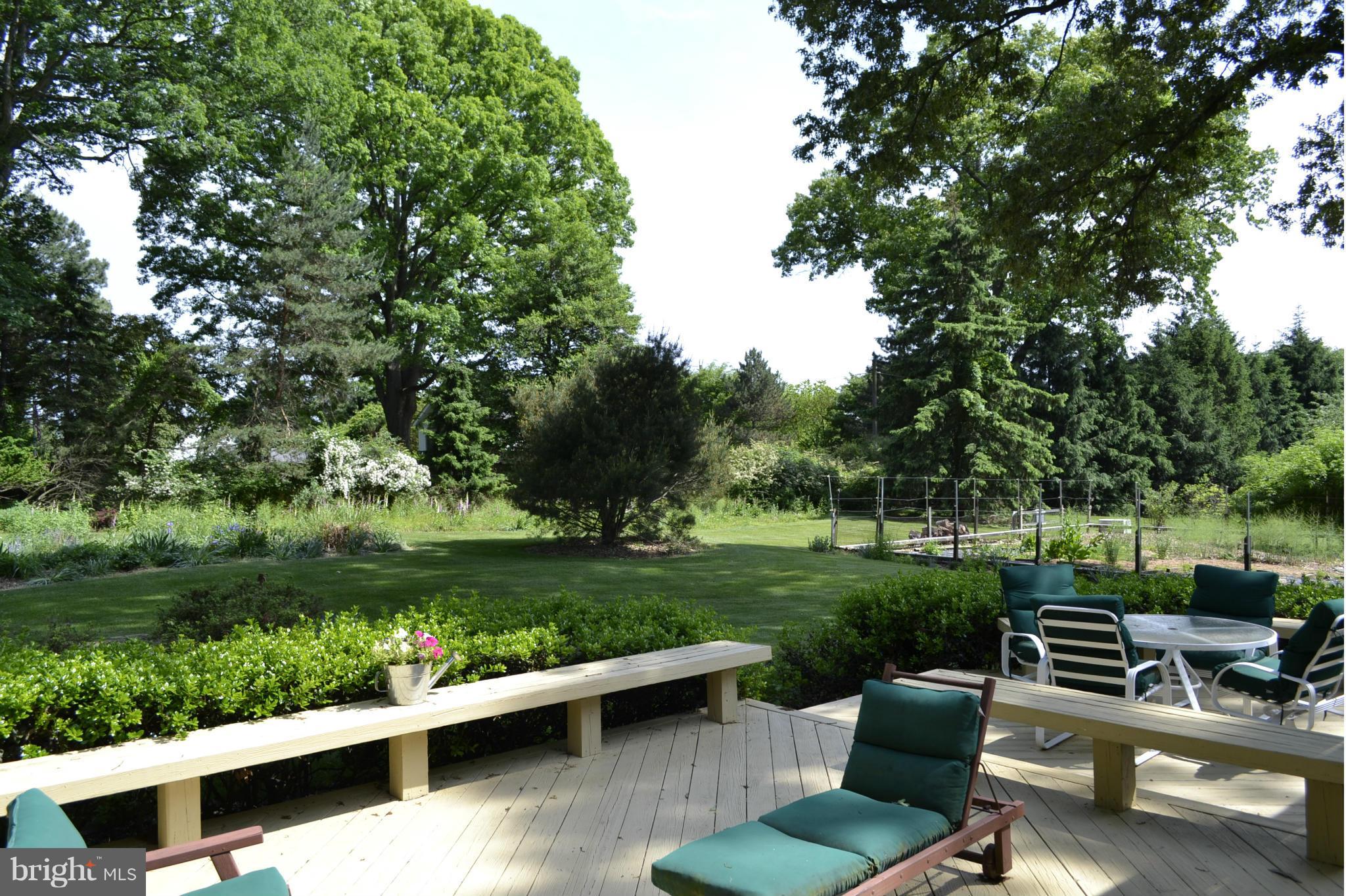 13407 Roxbury Road Silver Spring, MD 20904 - Photo 19 of 23 a view of a yard with furniture and garden