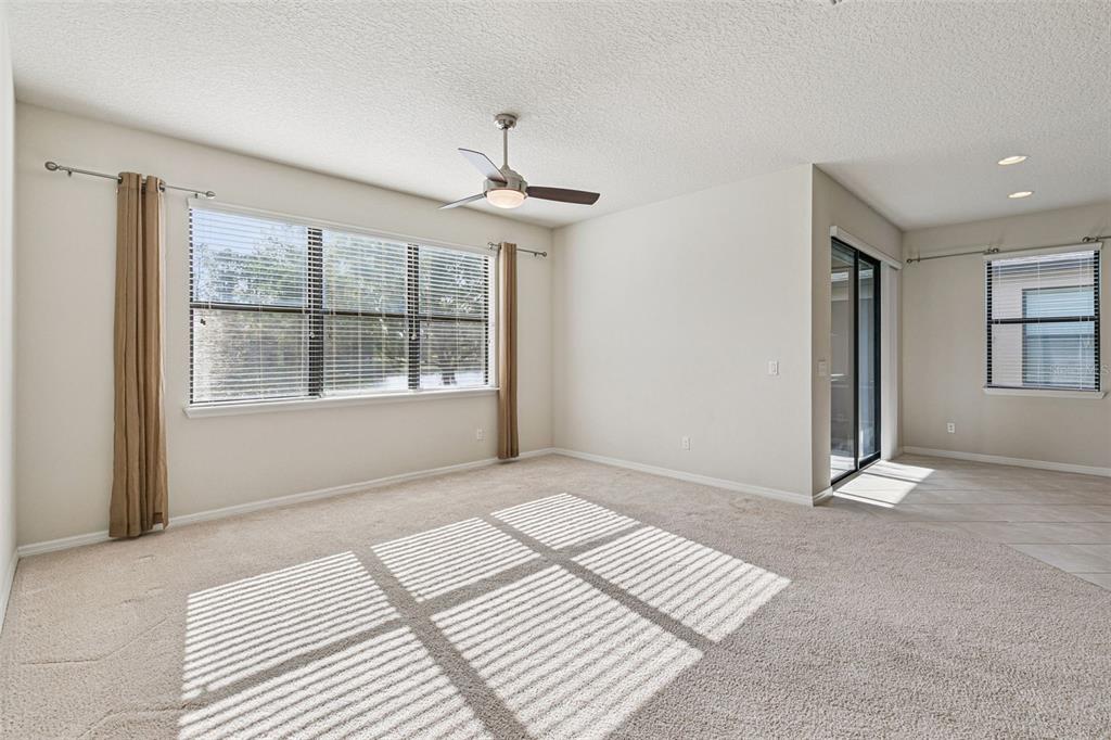 7137 Beek Street Windermere, FL 34786 - Photo 14 of 33 a view of an empty room with a window